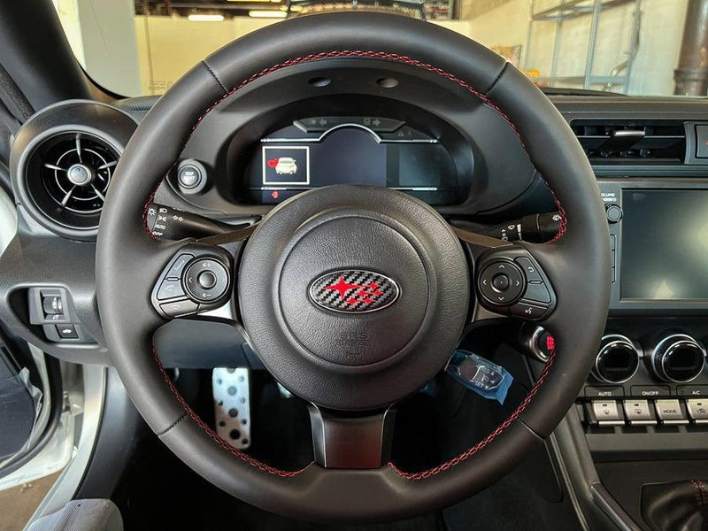 "STI" Steering Wheel Emblem Overlay V2 - 2022+ BRZ - StickerFab