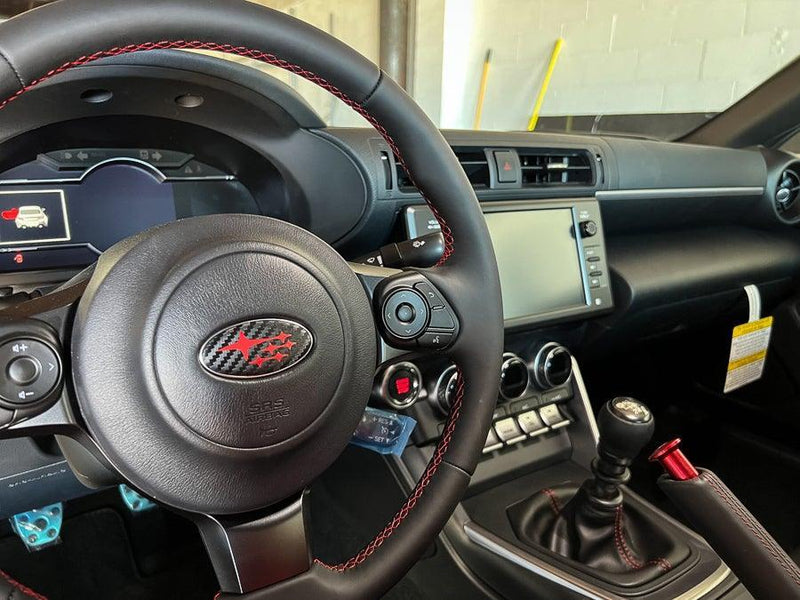 "STI" Steering Wheel Emblem Overlay V2 - 2022+ BRZ - StickerFab