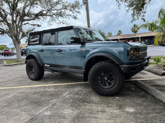 WeatherTech No Drill Mudflaps (Front) - 2021+ Bronco with Sasquatch Package (315s) - StickerFab